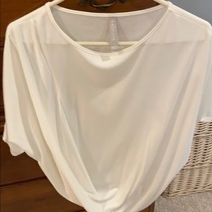 Dolman sleeves. White Tee shirt